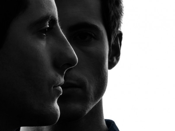 close up portrait two  men twin brother friends silhouette