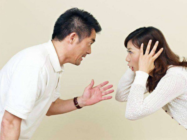 young asian couple having an argument.