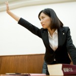 Lawyer raising hand