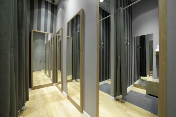 interior of dressing room at cloth store