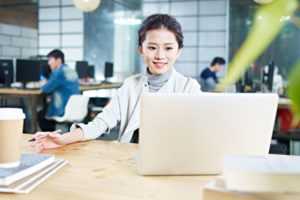 young asian business woman working in office