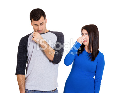 stock-photo-34468644-woman-looking-at-man-who-sniffs-himself